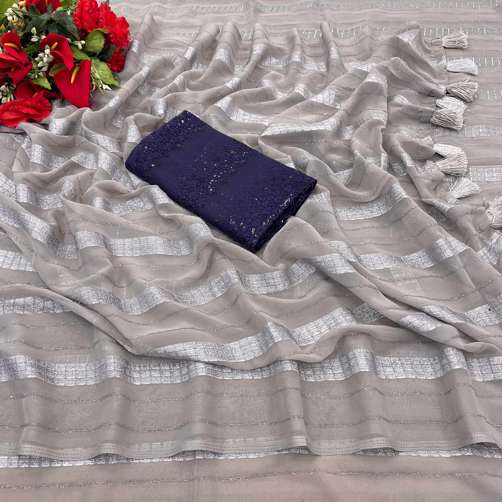 Peachmode Grey Zari Striped Georgette Saree With Tassels