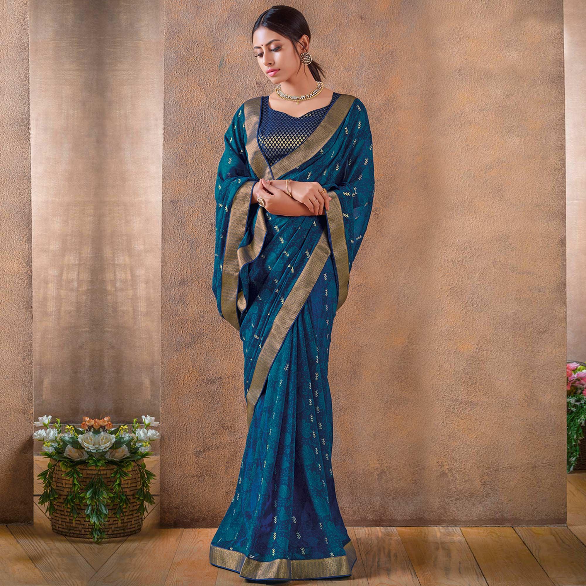 Peachmode Innovative Blue Colored Festive Wear Foil Printed Georgette Saree