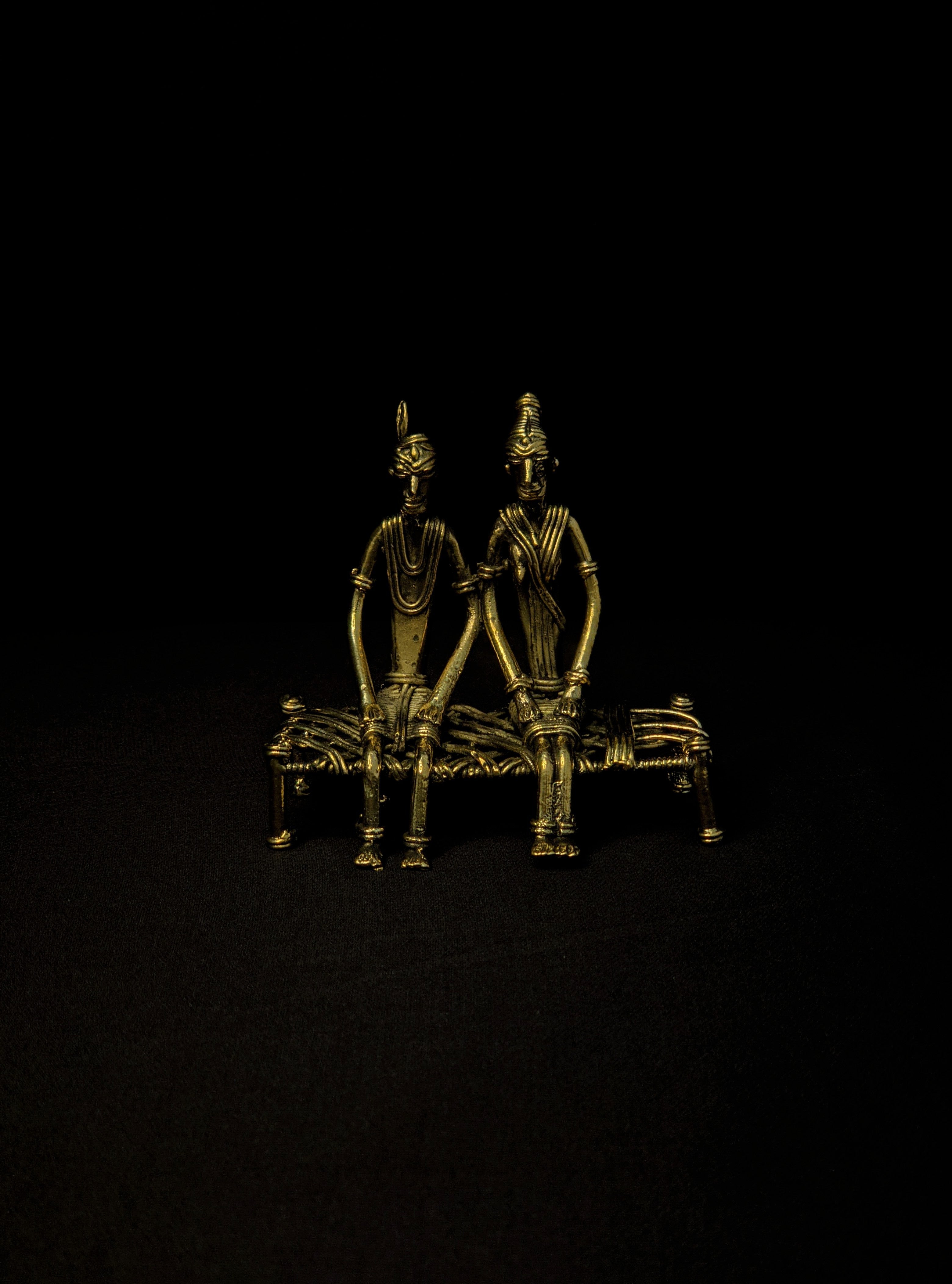 IndianVillèz Handmade Dhokra Tribal Couple Sitting on Bed