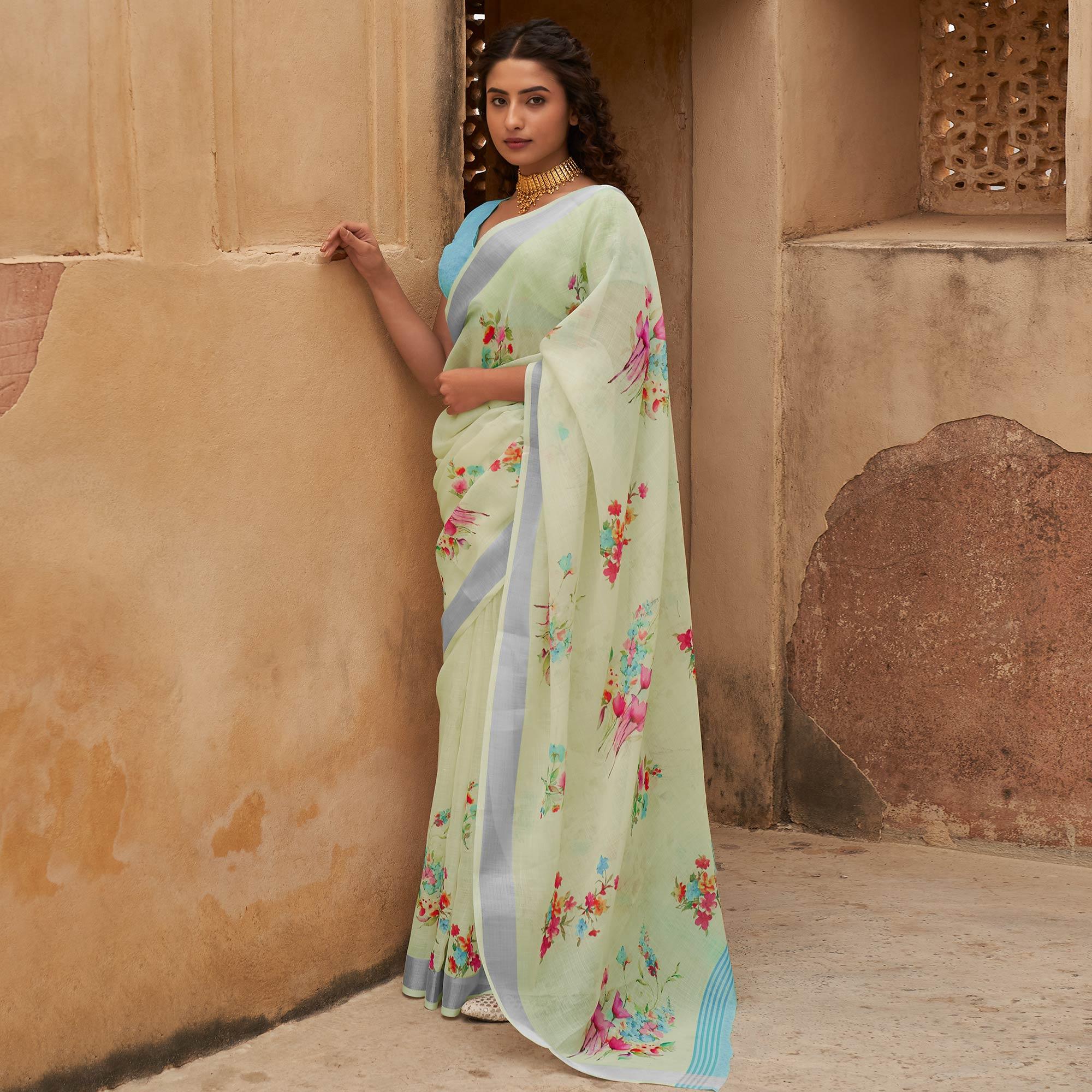Peachmode Light Green Casual Wear Floral Printed Zari Border Soft Linen Cotton Saree
