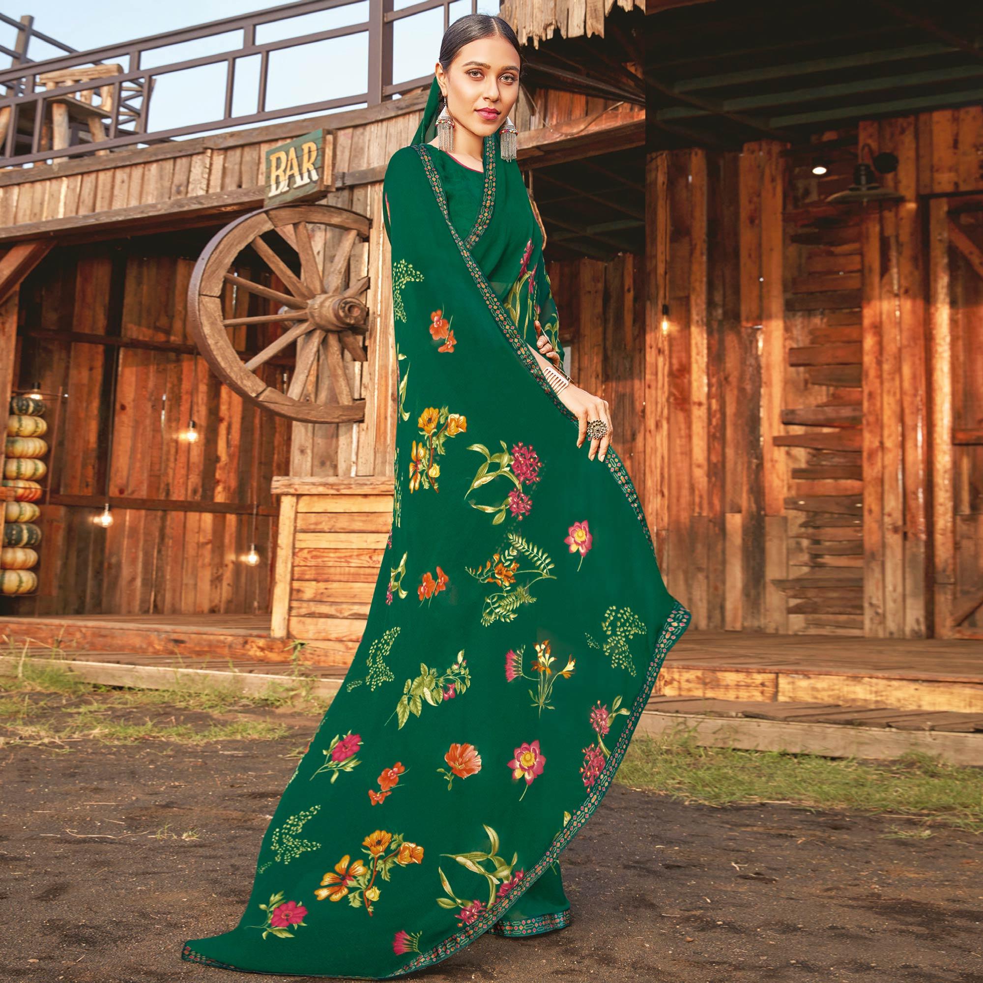 Peachmode Ideal Bottle Green Coloured Partywear Pure Georgette Floral Printed Saree With Fancy Lace Border