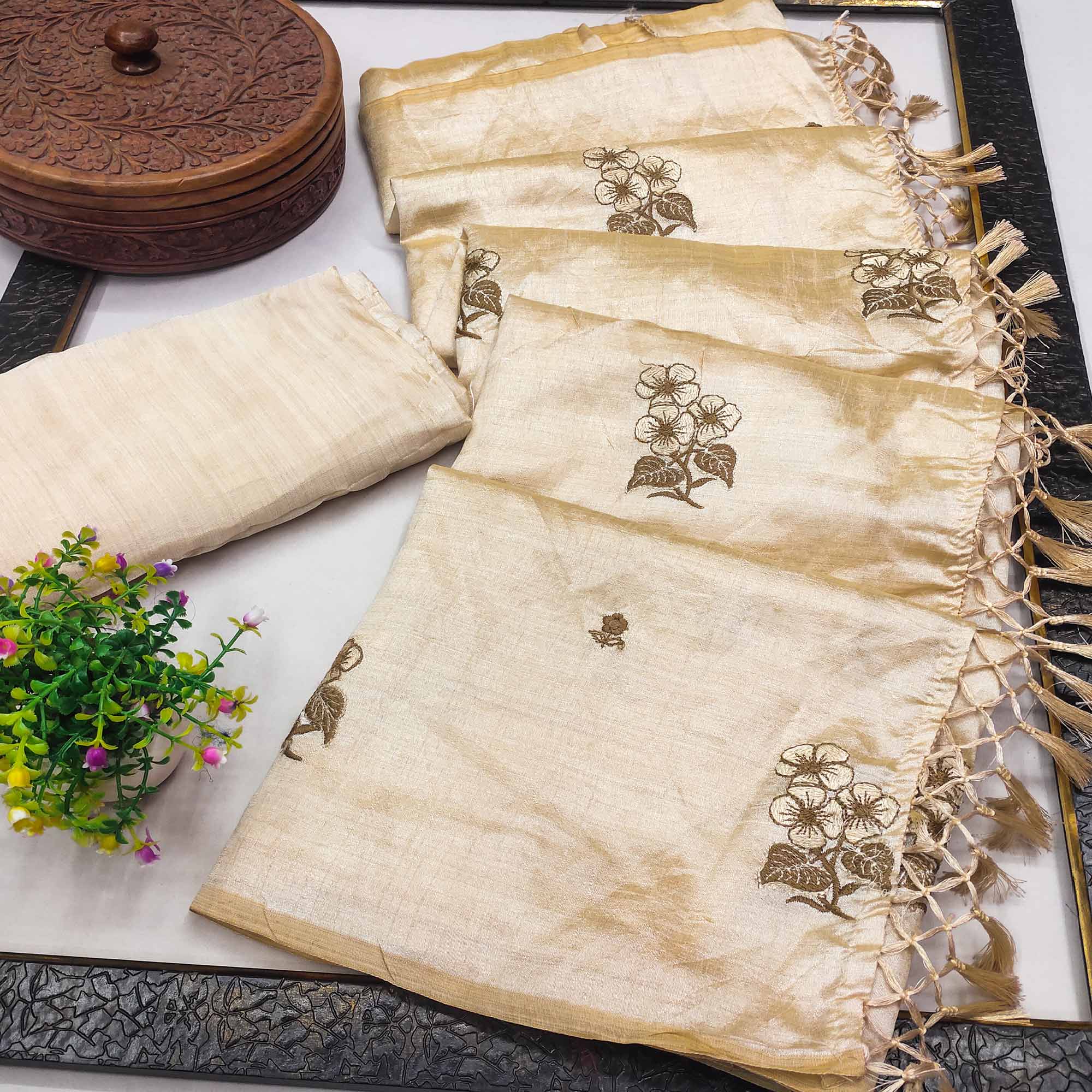 Peachmode Cream Floral Embroidered Assam Silk Saree With Tassels