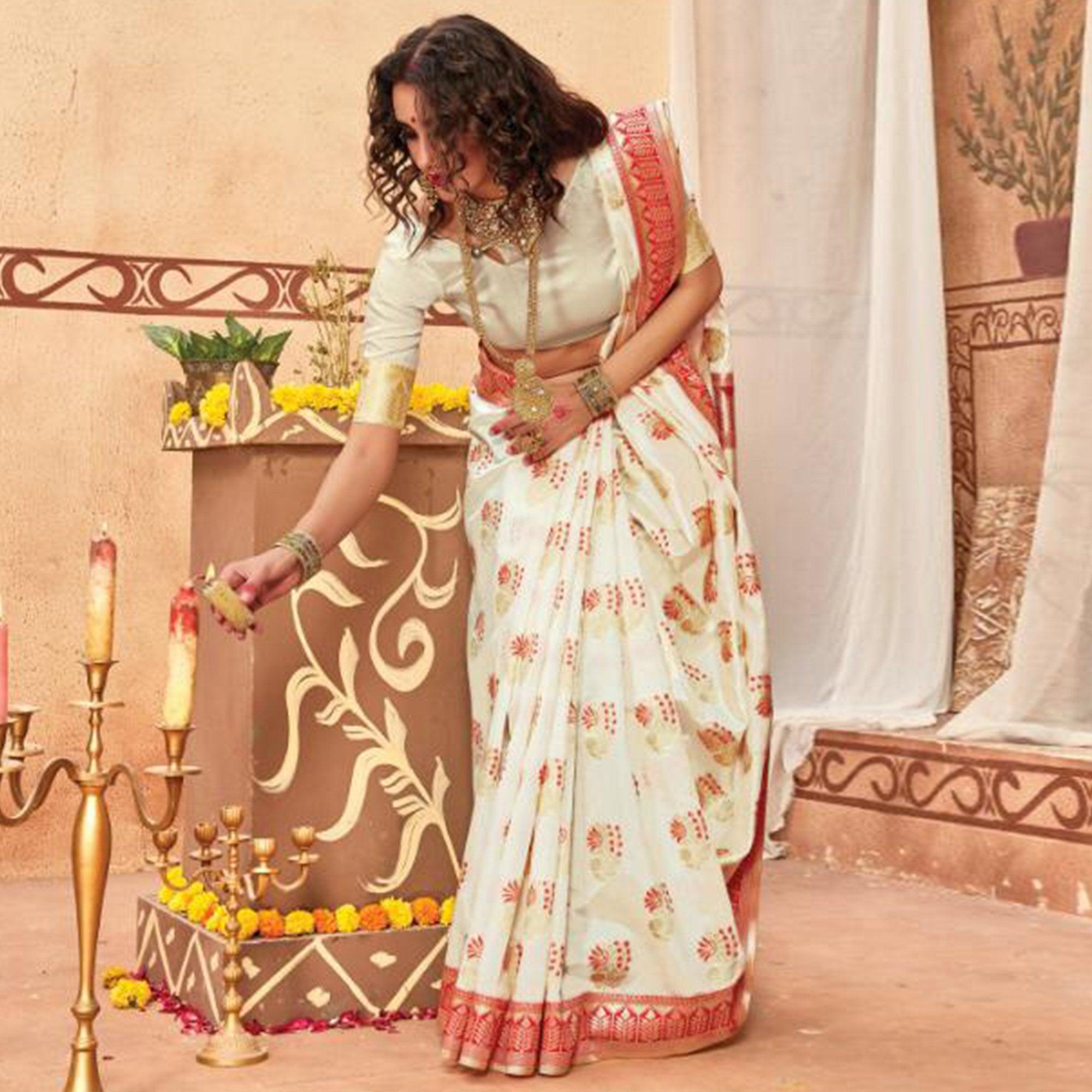 Peachmode Elegant Cream Colored Festive Wear Woven Silk Blend Saree With Tassels