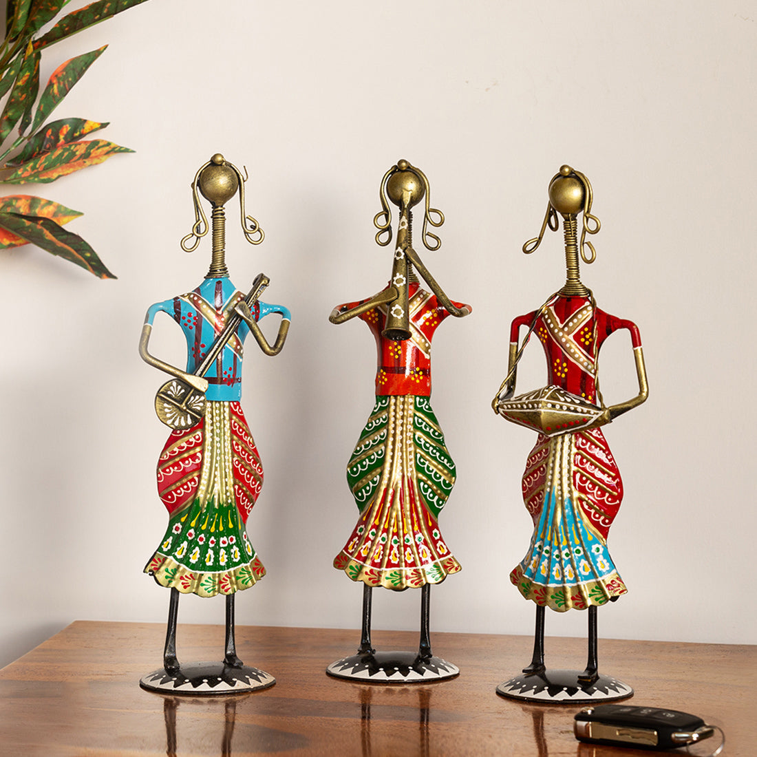 EXCLUSIVELANE 'Rajasthani Tribal Lady Musicians' Handpainted Decorative Showpieces (12 Inch, Set of 3, Iron)