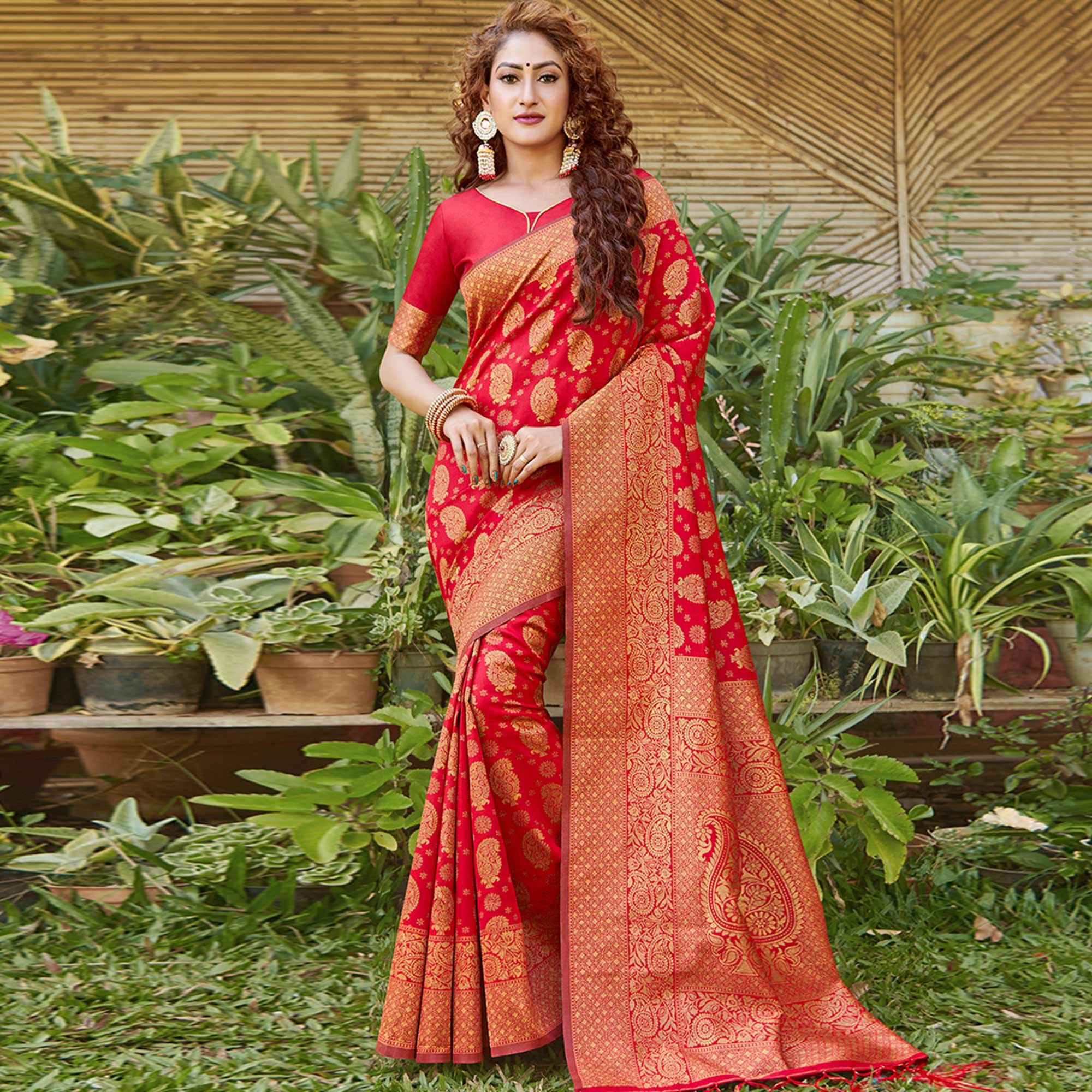 Peachmode Breathtaking Red Colored Festive Wear Paisely Woven Silk Blend Saree With Tassels