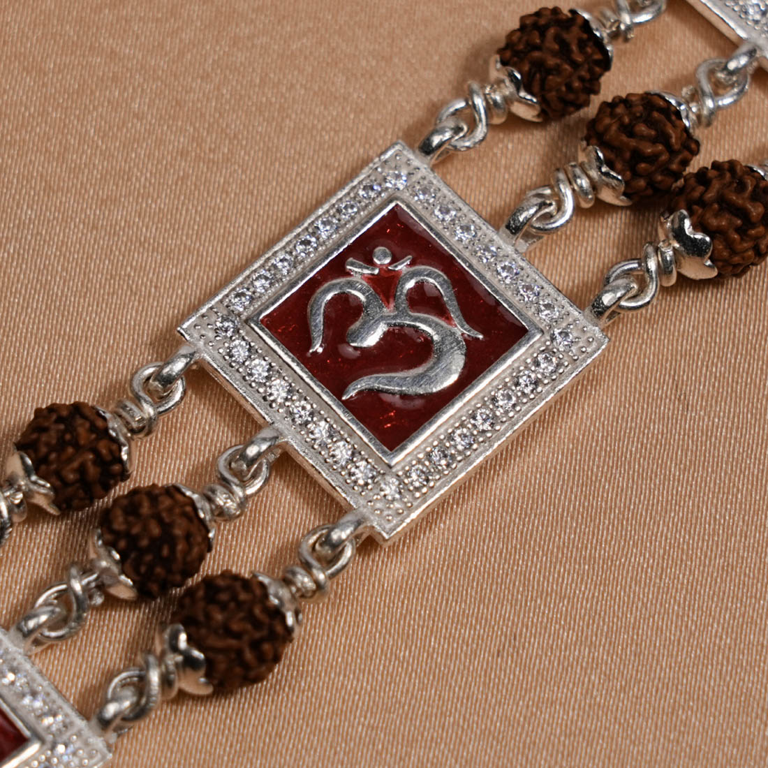 Prinjal Jewellers Rudraksha Silver Om With Shree Tripal Line Bracelet