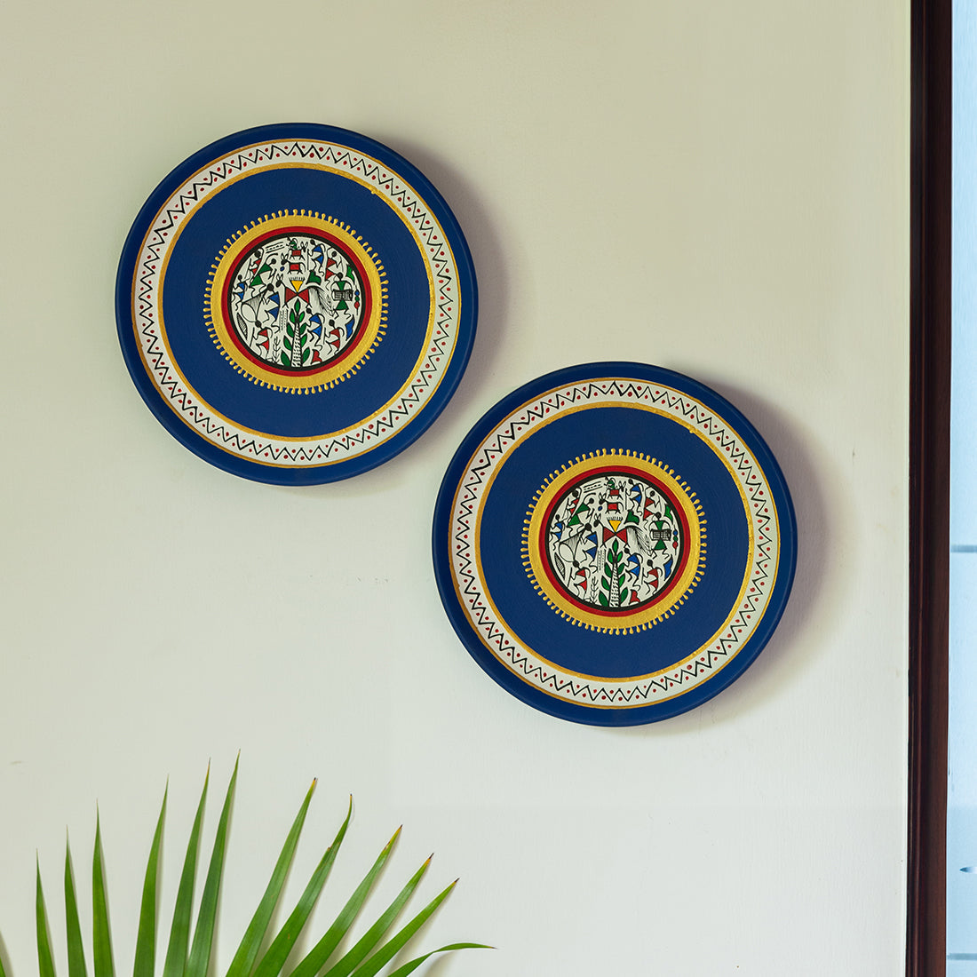 EXCLUSIVELANE 'The Warli Tales' Hand Painted Terracotta Wall Plates Wall Décor (8 inch, Set of 2, Blue)