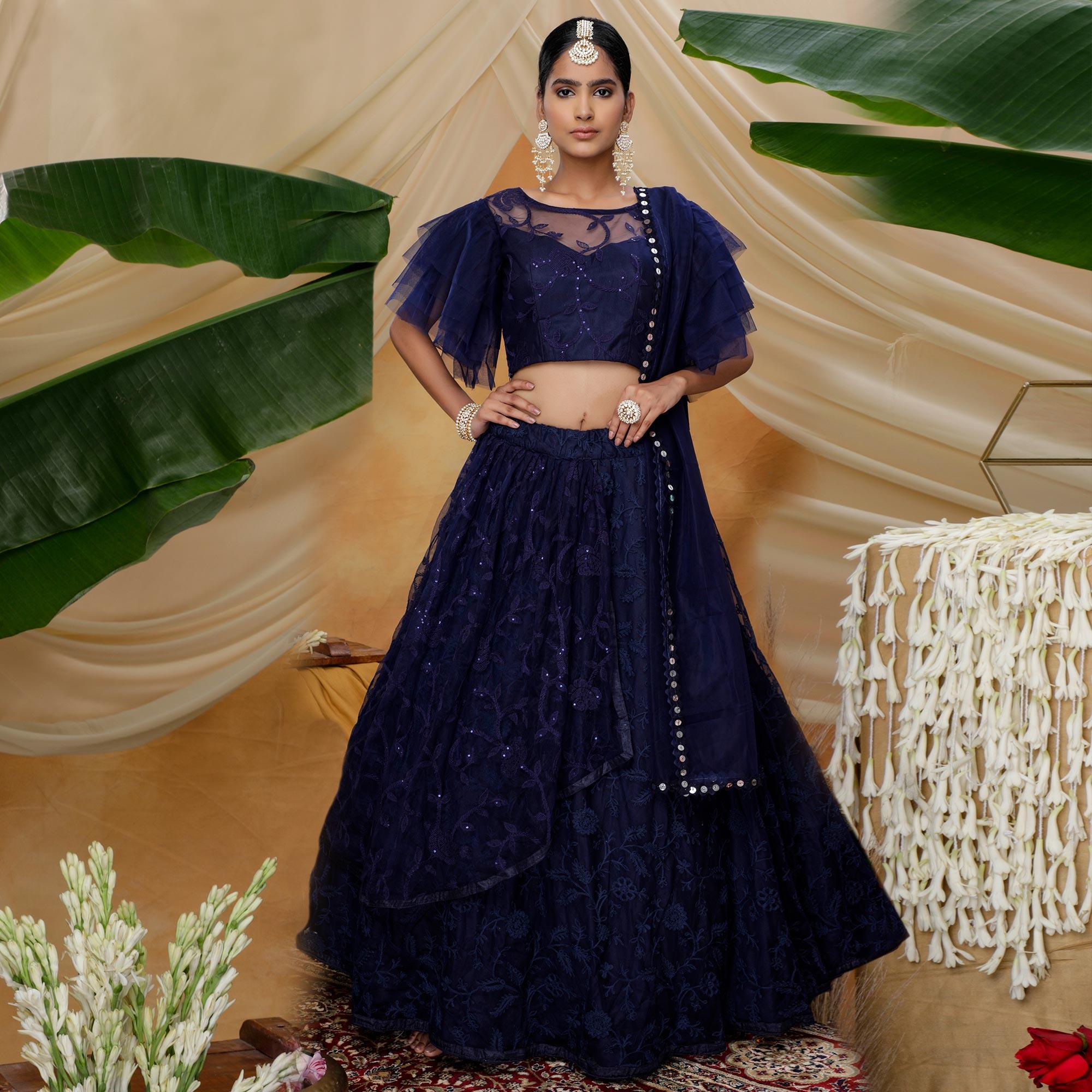Peachmode Hypnotic Navy Blue Colored Designer Partywear Embroidered Net Lehenga Choli