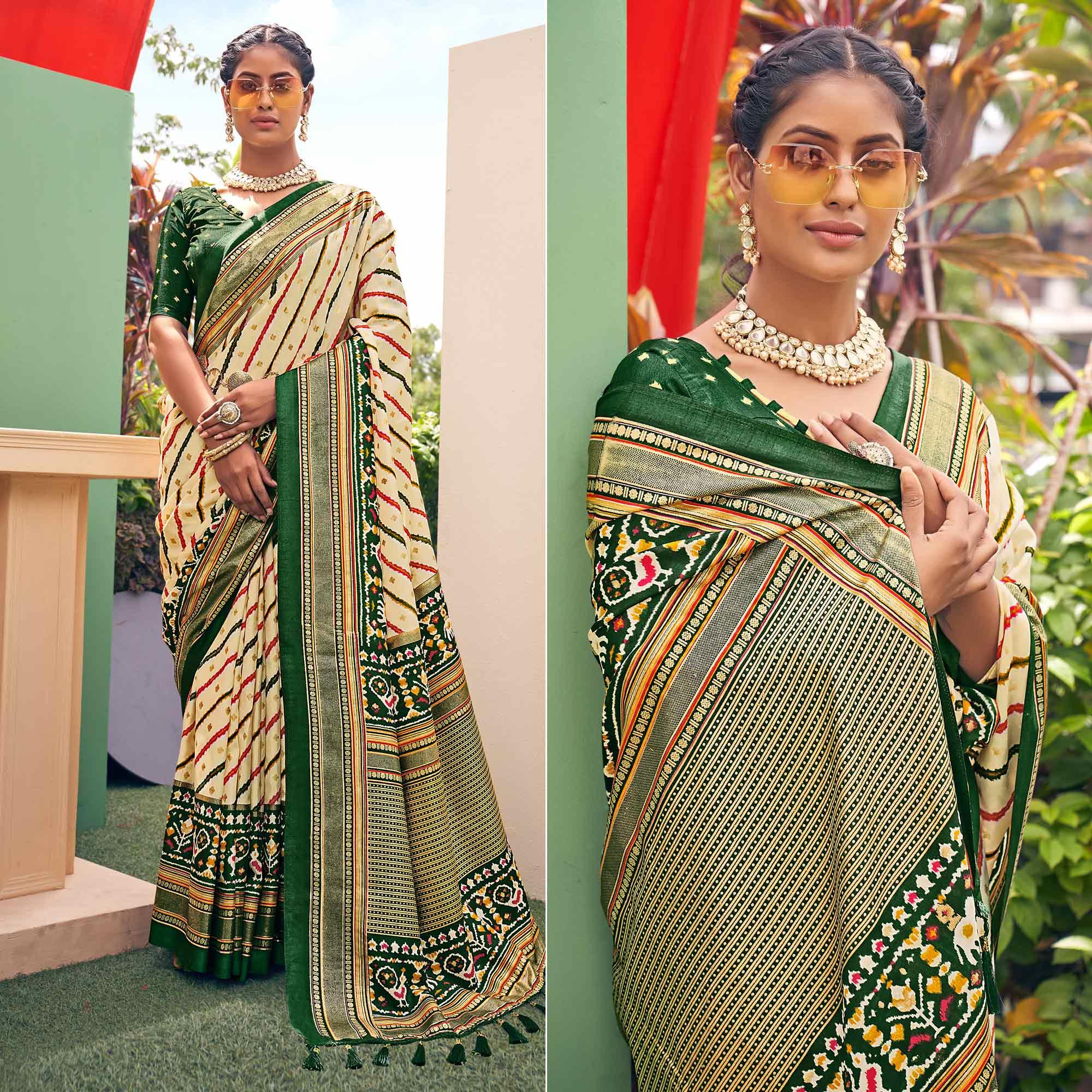 Peachmode Cream Patola Printed Silk Saree With Tassels
