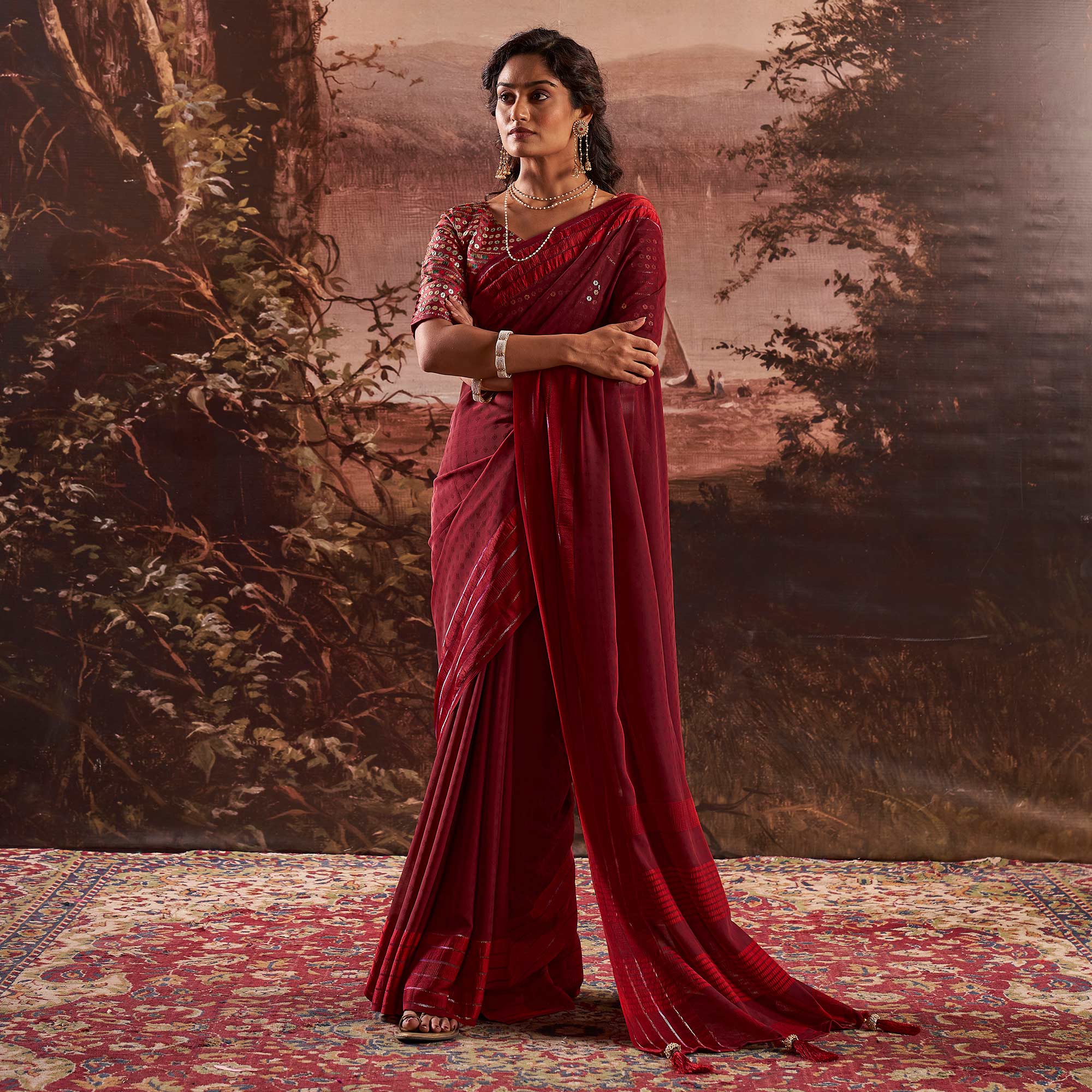 Peachmode Maroon Woven Georgette Saree With Tassels