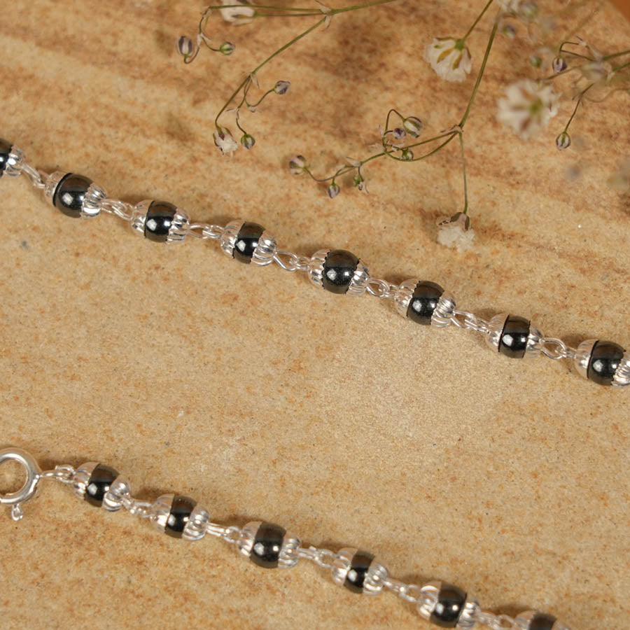 Prinjal Jewellers Black Beads Embedded in Silver Nazariya for Kids