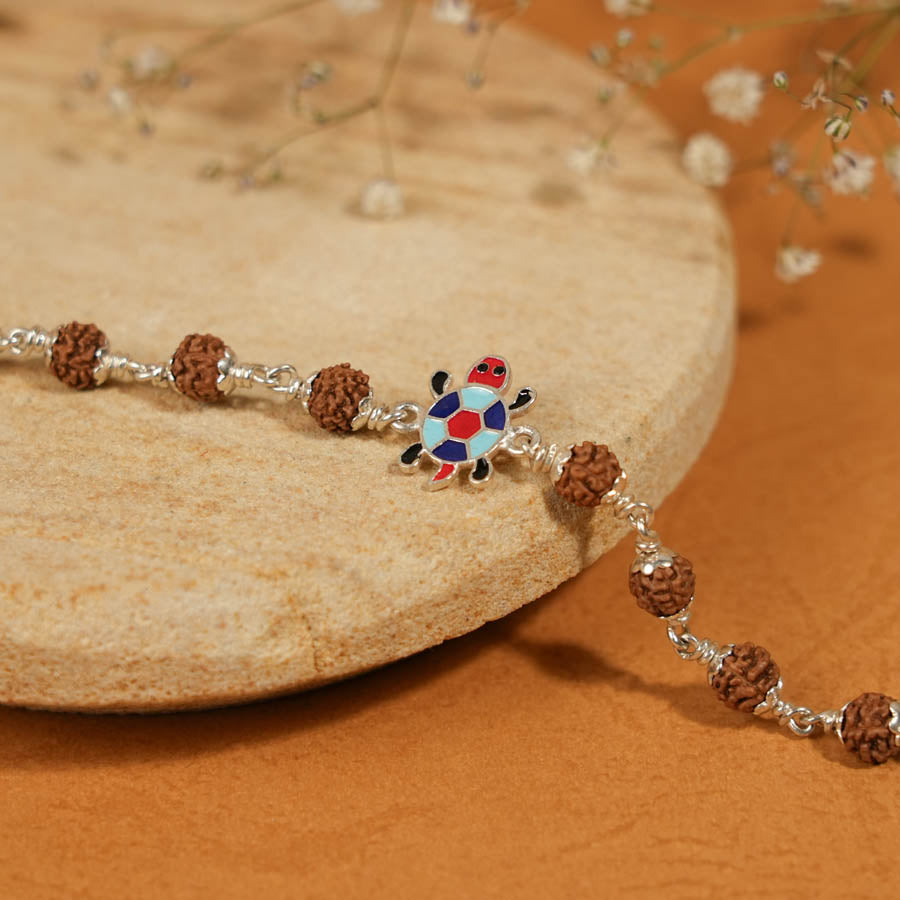 Prinjal Jewellers Rudraksha Silver Bracelet with Colorful Tortoise Single Line for Kids