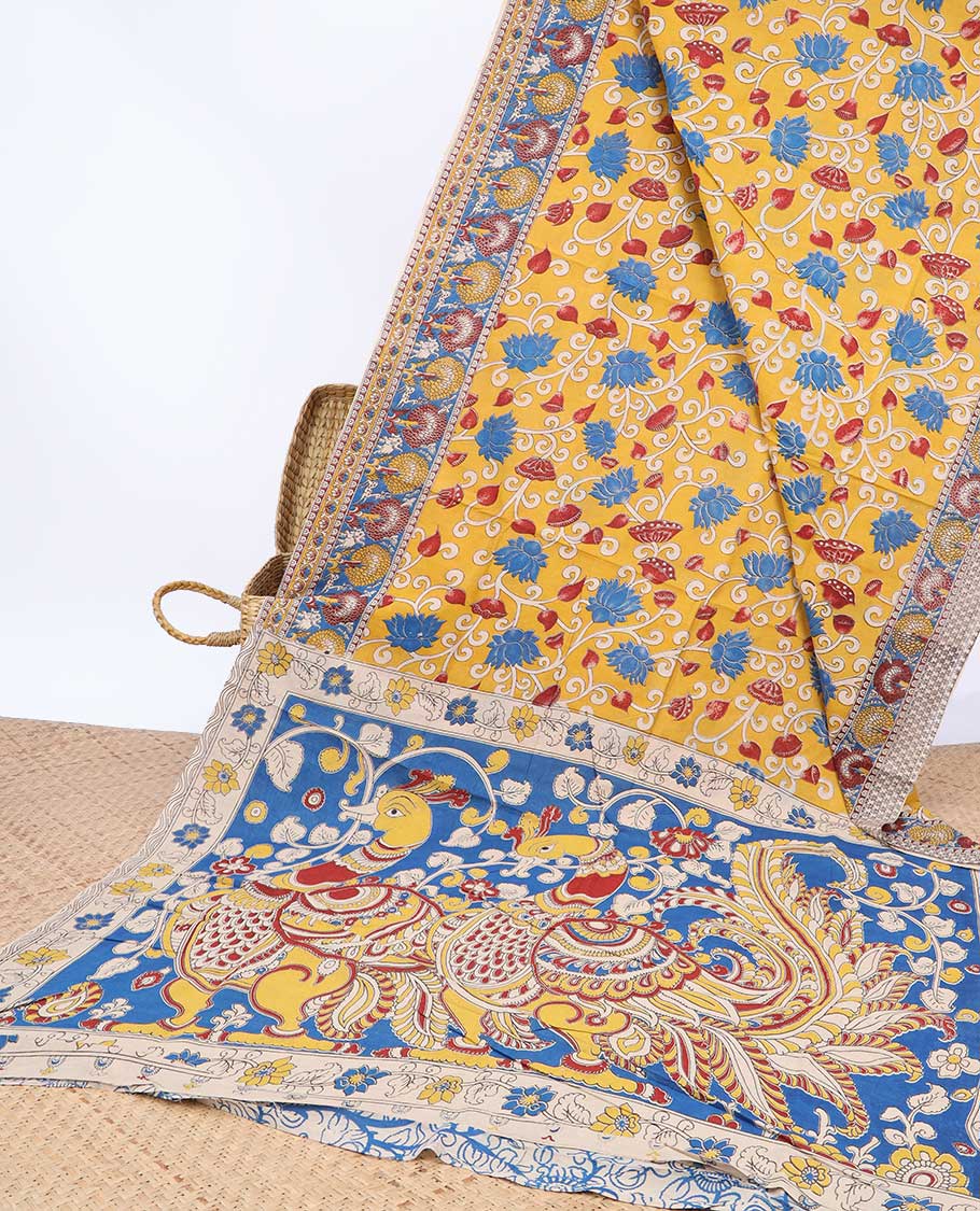 Pothys Yellow floral vine machine-printed kalamkari cotton saree, contrast tree motifs border & peacock pallu
