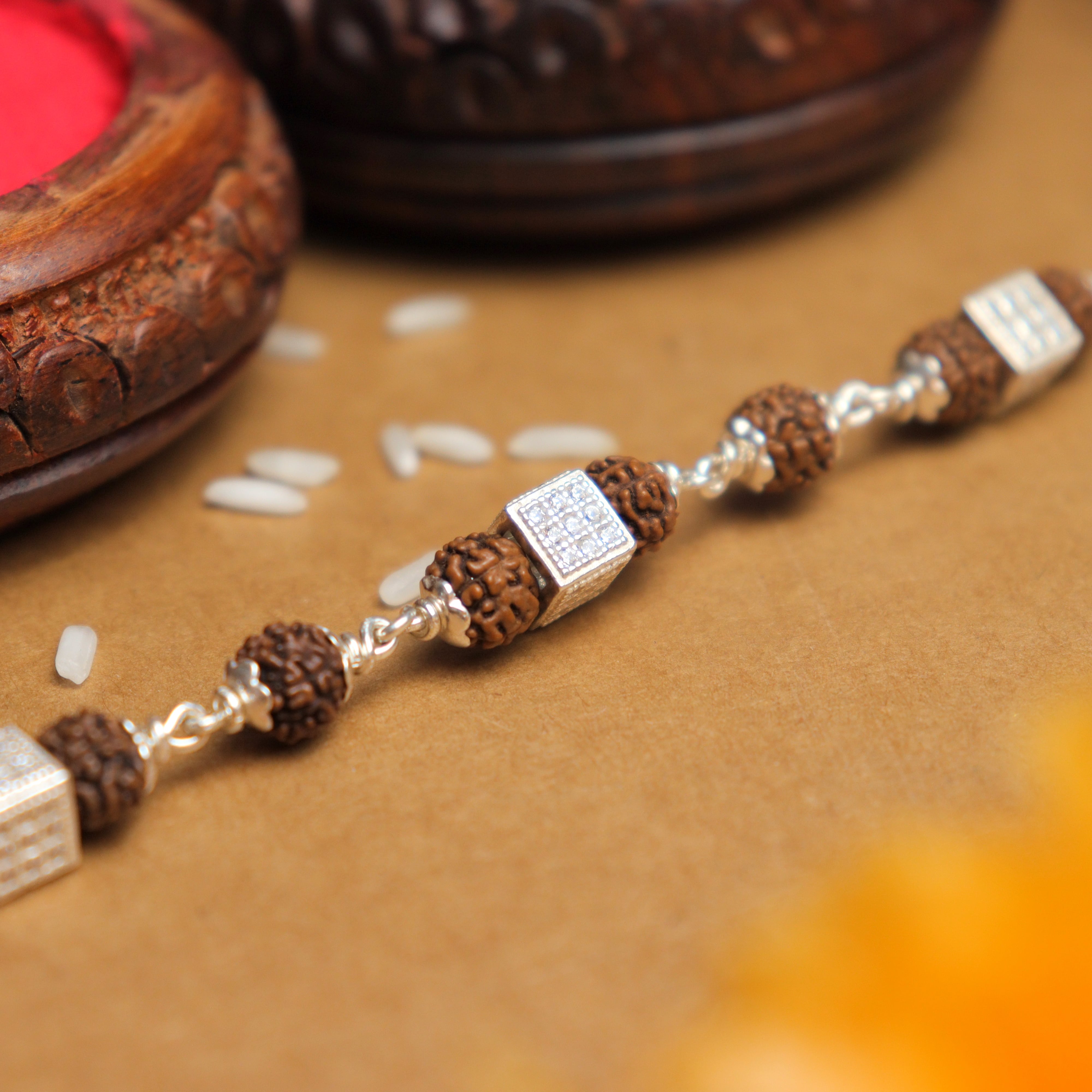 Prinjal Jewellers Single Line Rudraksha Silver Rakhi
