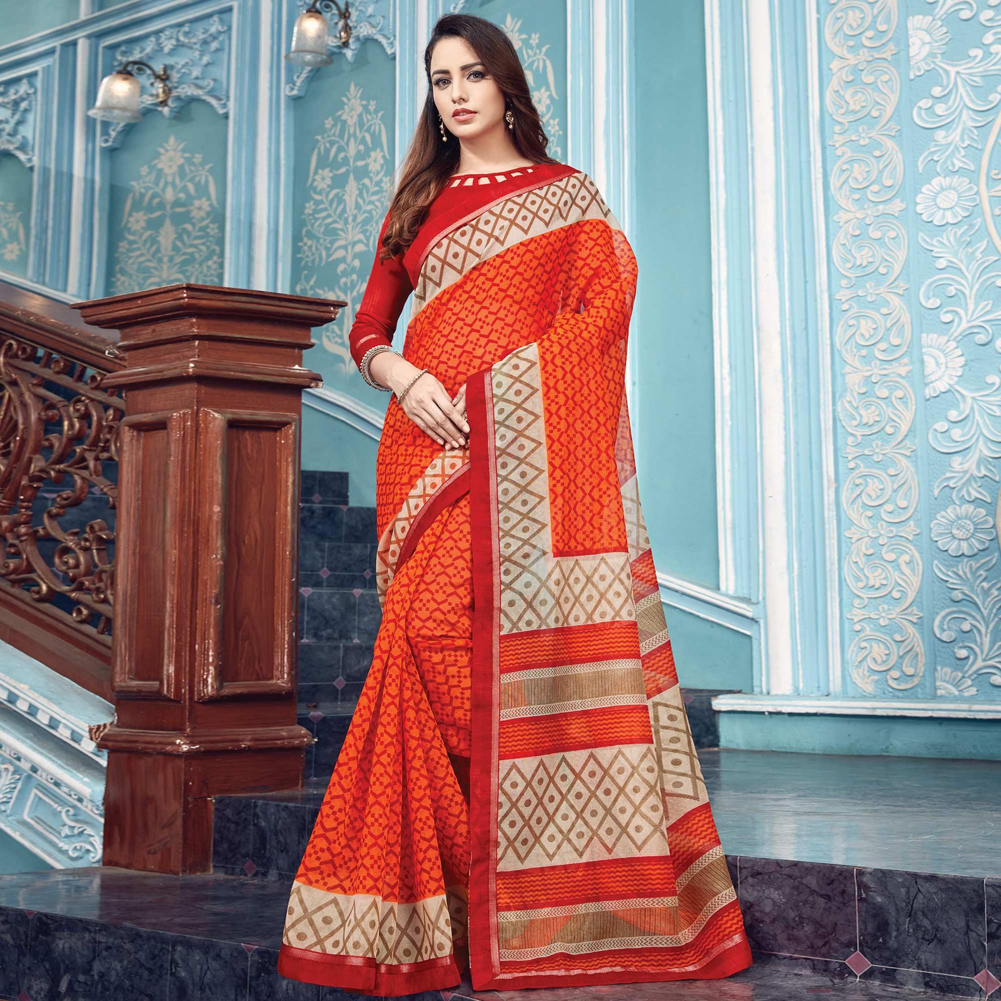 Peachmode Eye-catching Orange Colored Partywear Printed Silk Saree