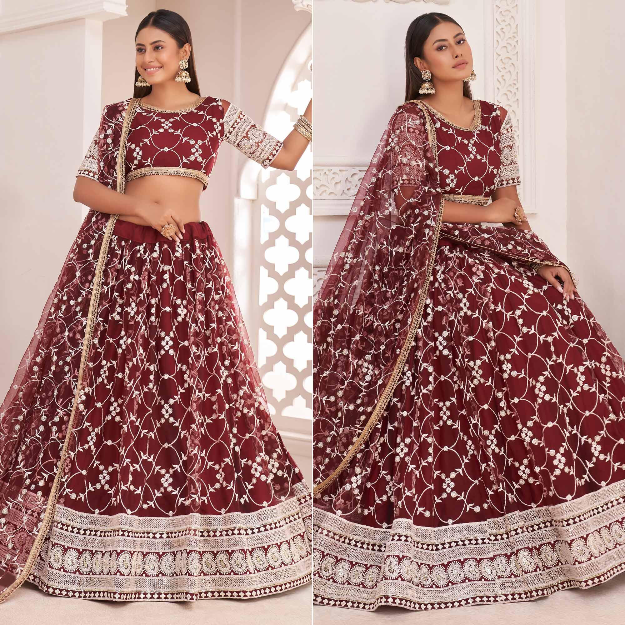 Peachmode Maroon Floral Sequins Embroidered Net Lehenga Choli