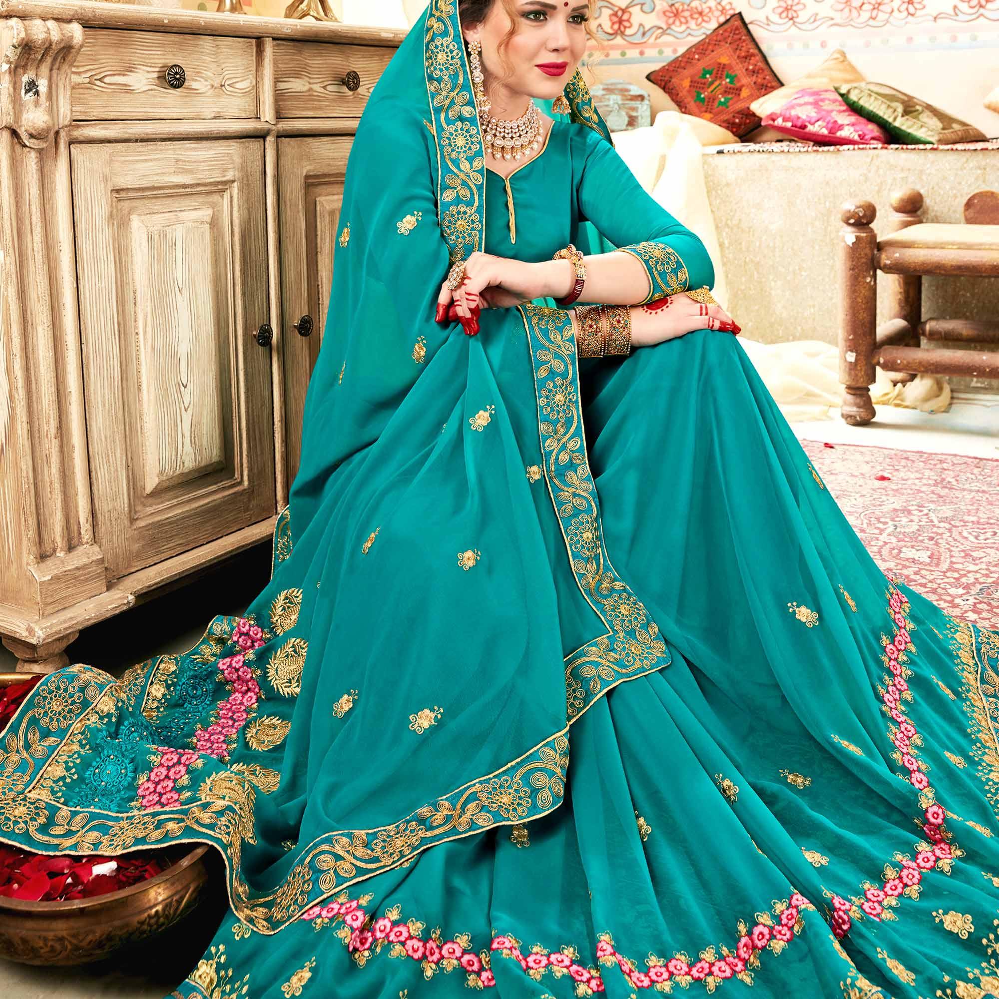 Peachmode Exceptional Aqua Blue Colored Partywear Embroidered Georgette Saree - view 2