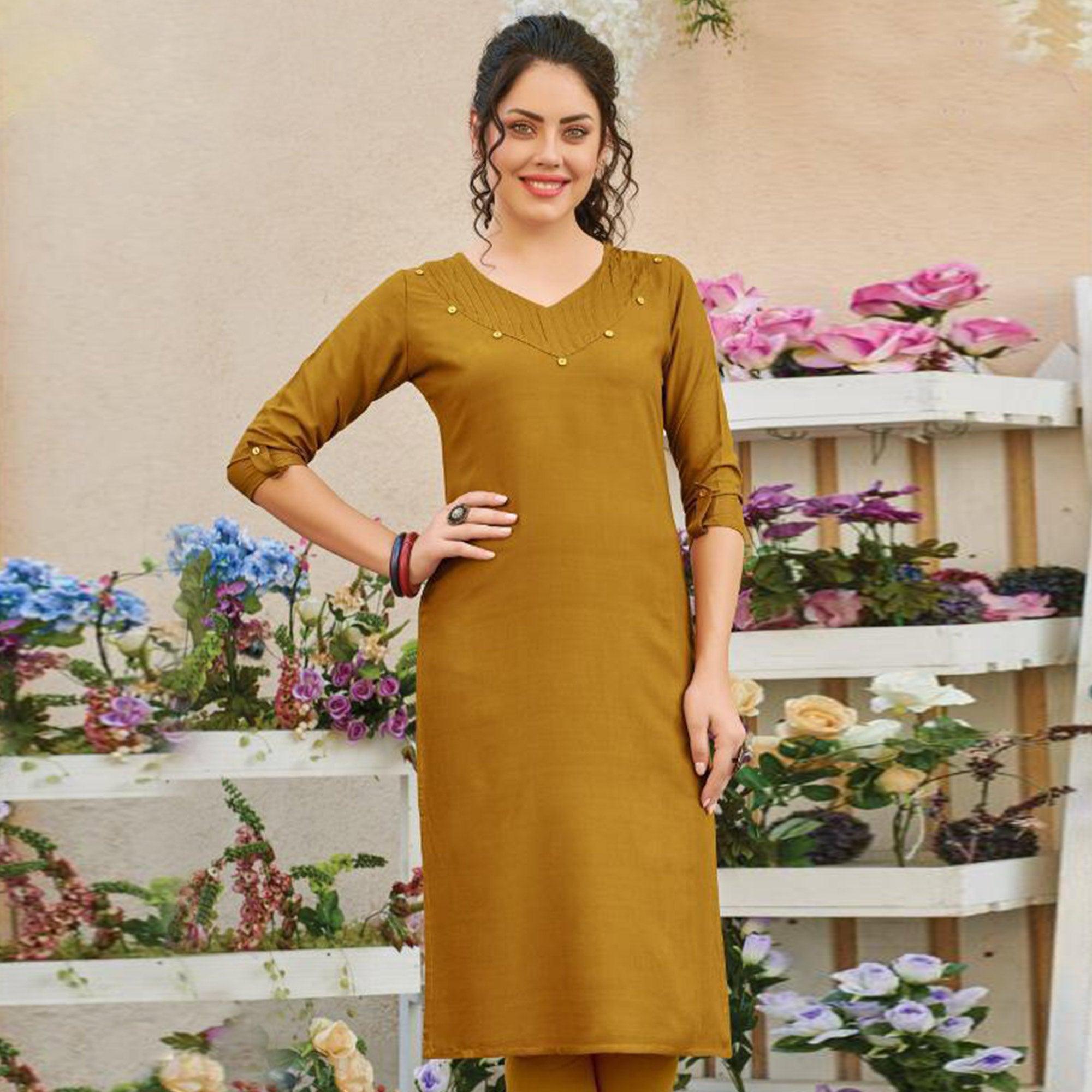 Peachmode Seller Flamboyant Mustard Yellow Colored Casual Wear Solid Pure Rayon Kurti
