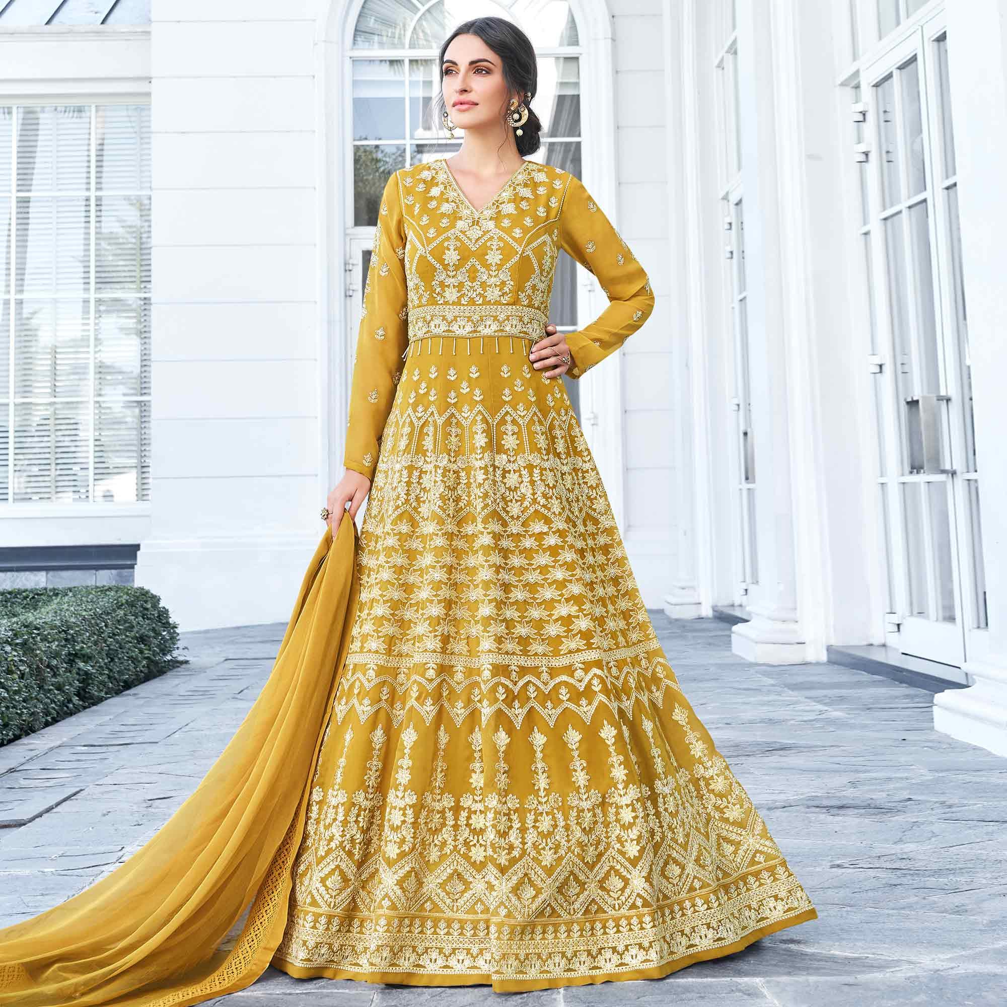 Peachmode Breathtaking Mustard Yellow Colored Partywear Embroidered Georgette Anarkali Suit
