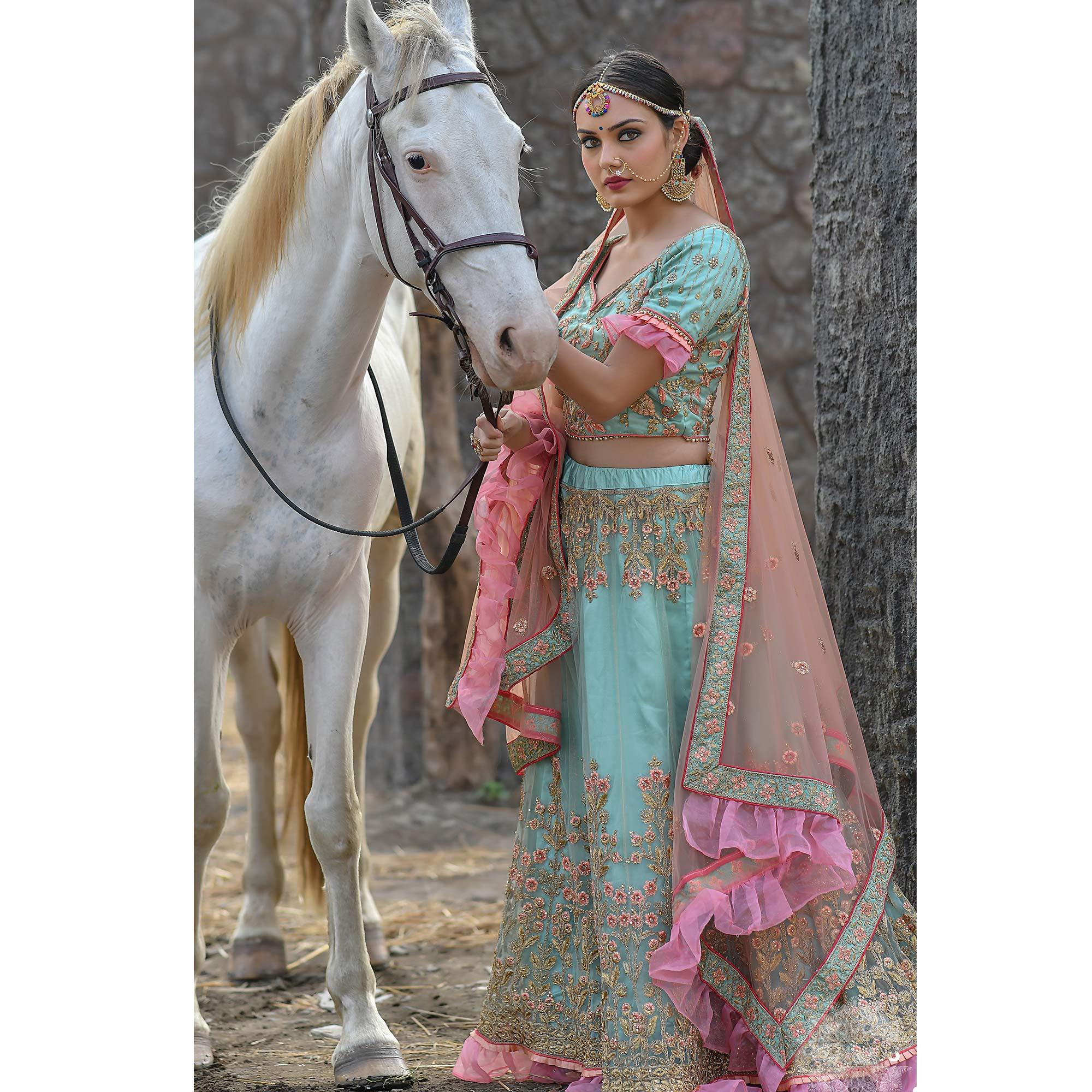 Peachmode Imposing Turquoise Colored Party Wear Embroidered Net Lehenga Choli - view 3