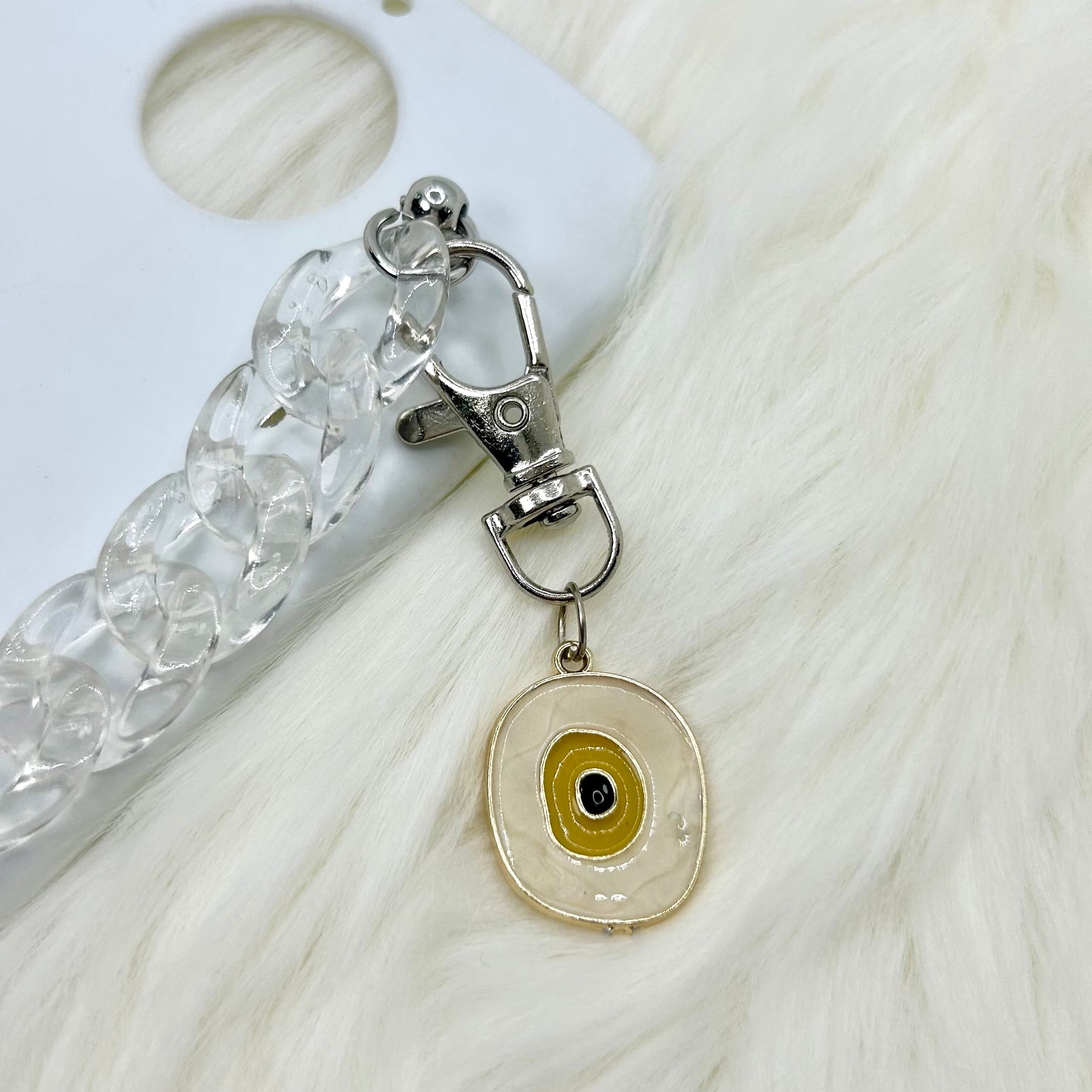 Casebasket Yellow-Eye Phone Charm