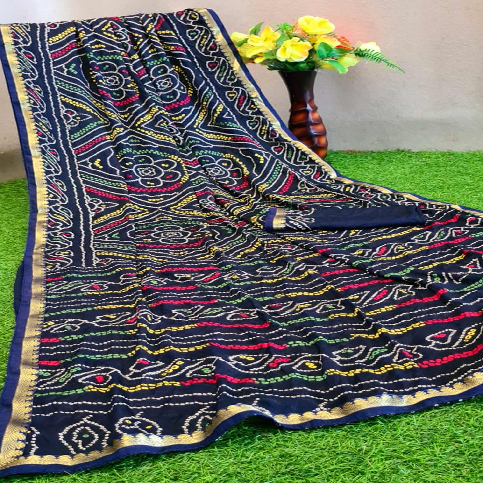 Navy sarees – BlackTree graceful-navy-blue-colored-festive-wear-woven-moss-georgette-saree-83795