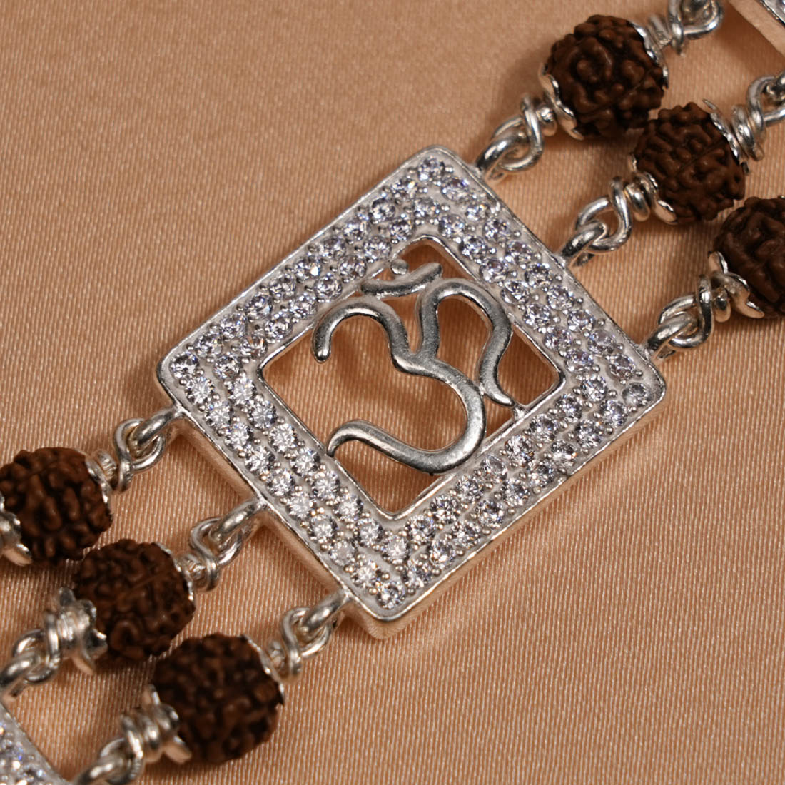 Prinjal Jewellers Rudraksha Silver Dimond Om Brooch Bracelet